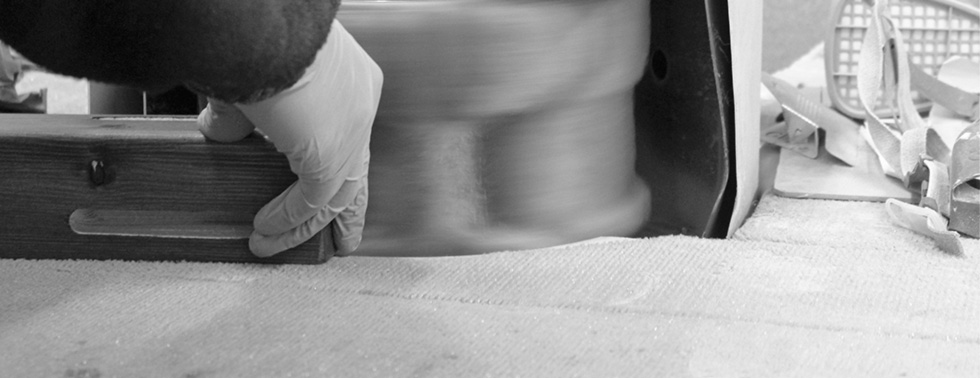 Sanding A Bed Leg in Workshop